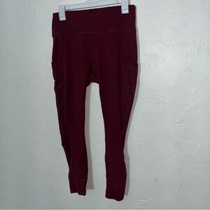 Fabletics Powerhold High-Waisted Mesh Side Leggings burgundy with side pockets